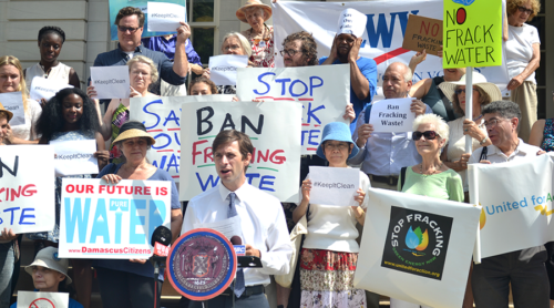 Councilmember Stephen Levin announces the frack waste ban (DCS's Mav Morehead is to his right)
